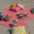 Image of a cheap picnic blanket on the beach. Print with your own design!