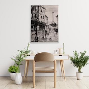 Panneau acoustique accroché à un mur au-dessus d'un bureau.