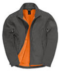 Diese Soft-Shell Jacke der Marke B&C wird von Helloprint mit orangener Innenfarbe und dunkel grauer Außenfarbe verkauft.
