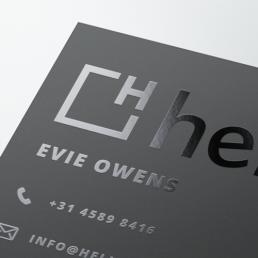Business cards with a spot UV foil paper finish, available at Helloprint